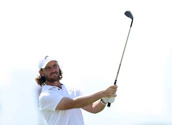 Tommy Fleetwood equals course record to lead in Abu Dhabi